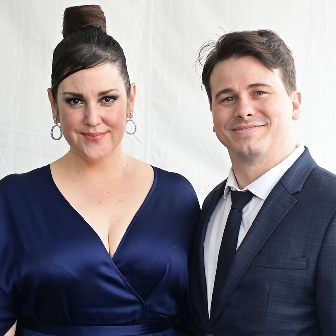 Jason Ritter and Melanie Lynskey sharing a heartfelt moment together.