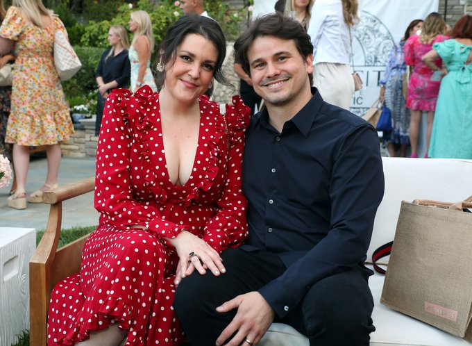 Jason Ritter and Melanie Lynskey sharing a heartfelt moment together.