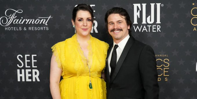 Jason Ritter and Melanie Lynskey sharing a heartfelt moment together.